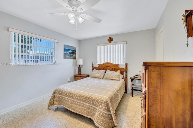6736 Orchid Dr, Miami Lakes, FL 33014 - bedroom featuring ceiling fan and speckle patterned floor