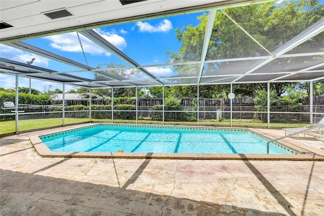 6736 Orchid Dr, Miami Lakes, FL 33014 - view of swimming pool with a fenced backyard, glass enclosure, and a patio