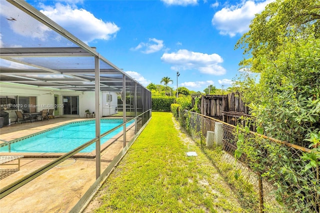 6736 Orchid Dr, Miami Lakes, FL 33014 - view of pool featuring a patio area, a fenced backyard, and glass enclosure