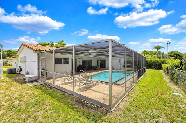 6736 Orchid Dr, Miami Lakes, FL 33014 - back of property with a patio area, a fenced backyard, stucco siding, and a lanai