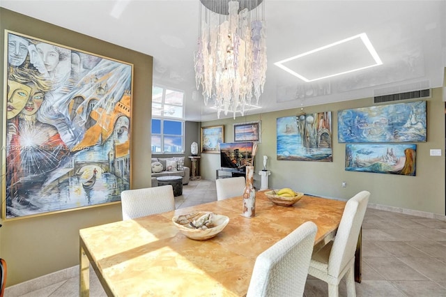 1833 S Ocean Dr Unit 1402, Hallandale Beach, FL 33009 - dining area with light tile patterned floors, a chandelier, and a skylight