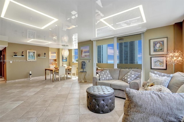 1833 S Ocean Dr Unit 1402, Hallandale Beach, FL 33009 - living room with light tile patterned flooring and baseboards