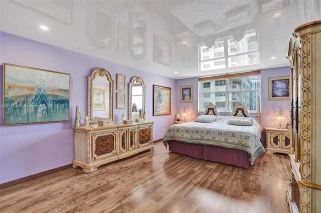 1833 S Ocean Dr Unit 1402, Hallandale Beach, FL 33009 - bedroom featuring wood finished floors, multiple windows, and recessed lighting