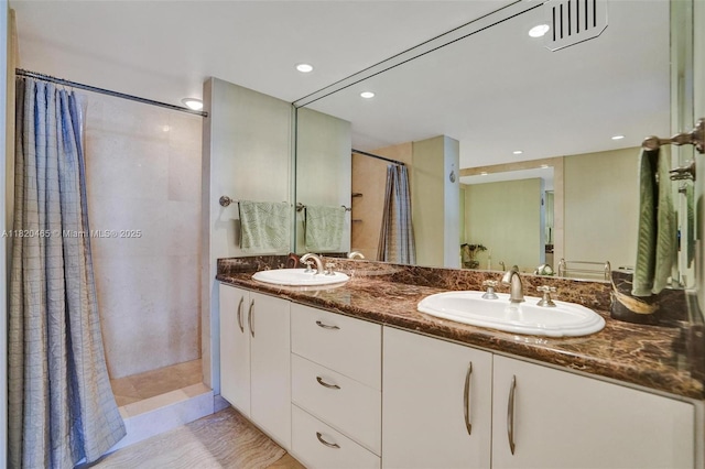 1833 S Ocean Dr Unit 1402, Hallandale Beach, FL 33009 - full bathroom featuring double vanity, a shower with shower curtain, and recessed lighting