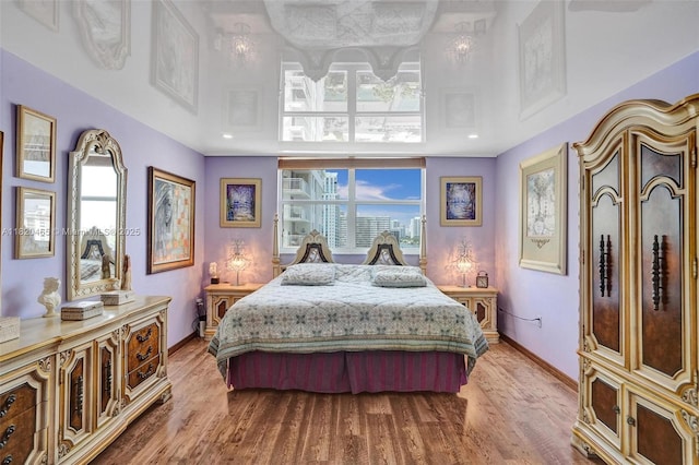 1833 S Ocean Dr Unit 1402, Hallandale Beach, FL 33009 - bedroom featuring multiple windows and light wood-type flooring