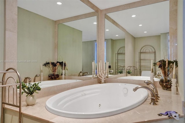 1833 S Ocean Dr Unit 1402, Hallandale Beach, FL 33009 - bathroom with a tub with jets, recessed lighting, and vanity