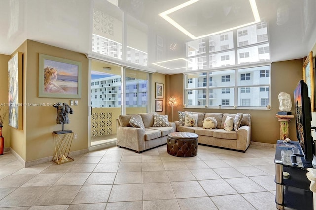 1833 S Ocean Dr Unit 1402, Hallandale Beach, FL 33009 - living room with light tile patterned floors and baseboards