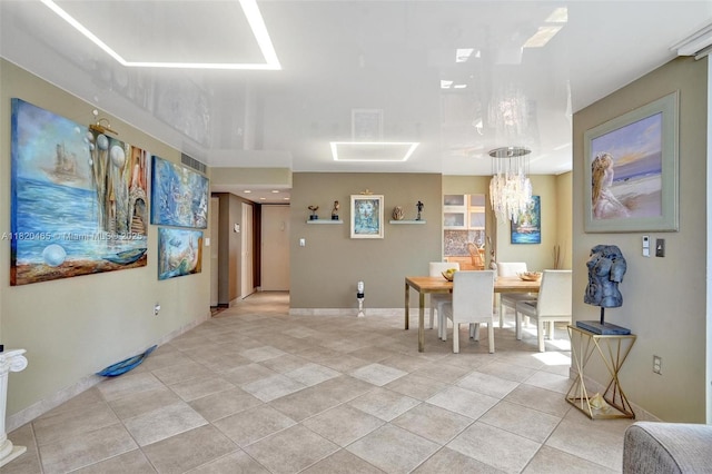 1833 S Ocean Dr Unit 1402, Hallandale Beach, FL 33009 - dining room with light tile patterned flooring and baseboards