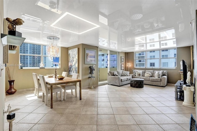 1833 S Ocean Dr Unit 1402, Hallandale Beach, FL 33009 - dining area with a chandelier and light tile patterned floors