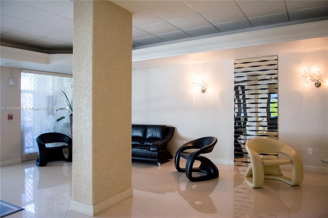 1833 S Ocean Dr Unit 1402, Hallandale Beach, FL 33009 - tiled living room with ornamental molding and a drop ceiling