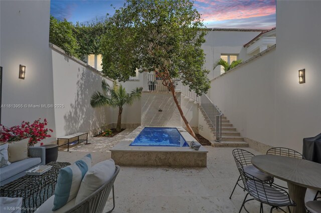 647 Almeria Ave, Coral Gables, FL 33134 - view of pool featuring stairs, a patio area, an outdoor living space, and a jacuzzi