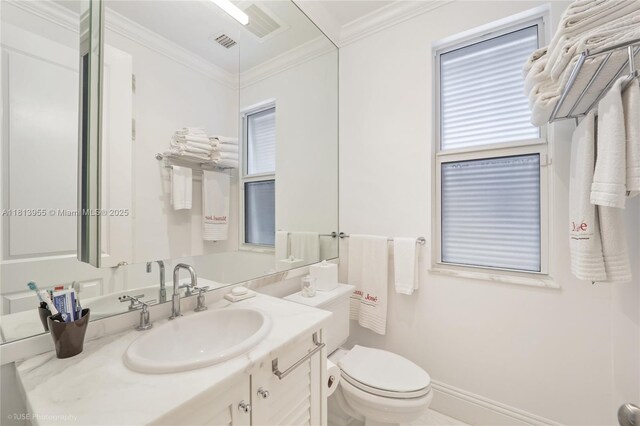 647 Almeria Ave, Coral Gables, FL 33134 - bathroom featuring vanity and crown molding