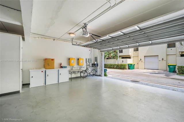 647 Almeria Ave, Coral Gables, FL 33134 - garage featuring a garage door opener