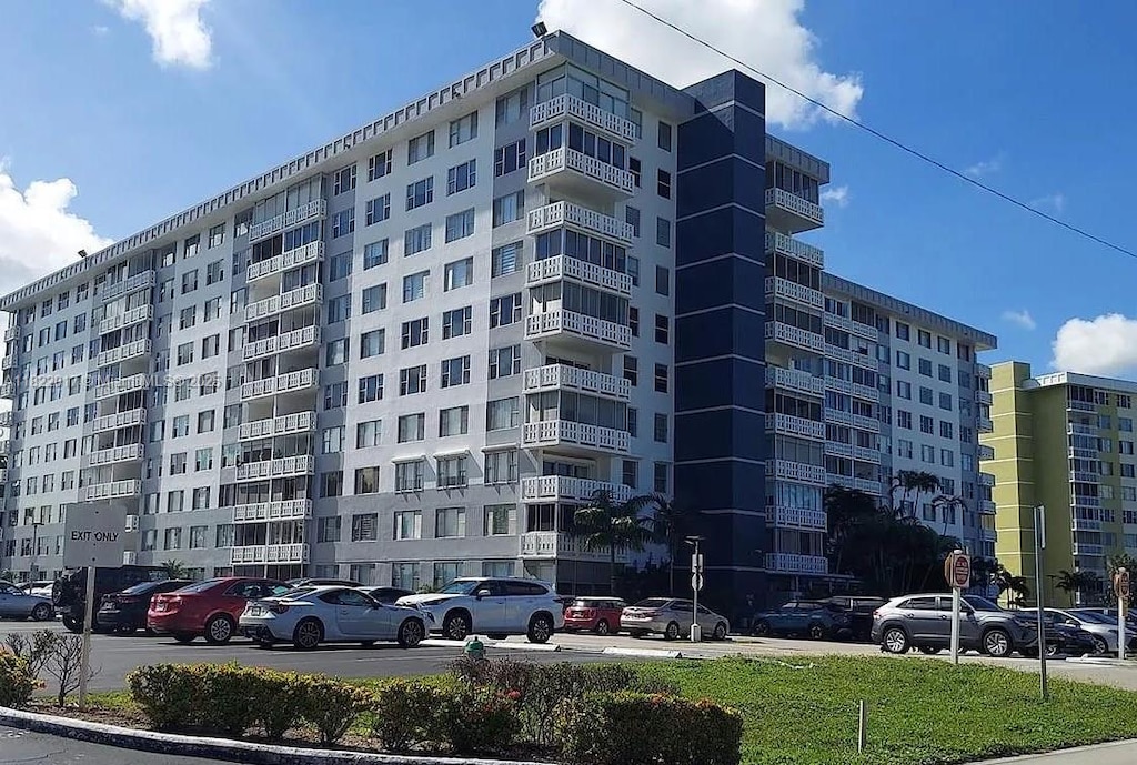 4350 Hillcrest Dr Unit 1014, Hollywood, FL 33021 - view of apartment building / complex featuring uncovered parking