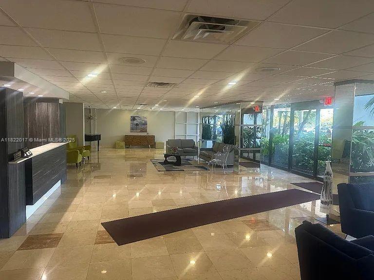 4350 Hillcrest Dr Unit 1014, Hollywood, FL 33021 - community lobby with a drop ceiling