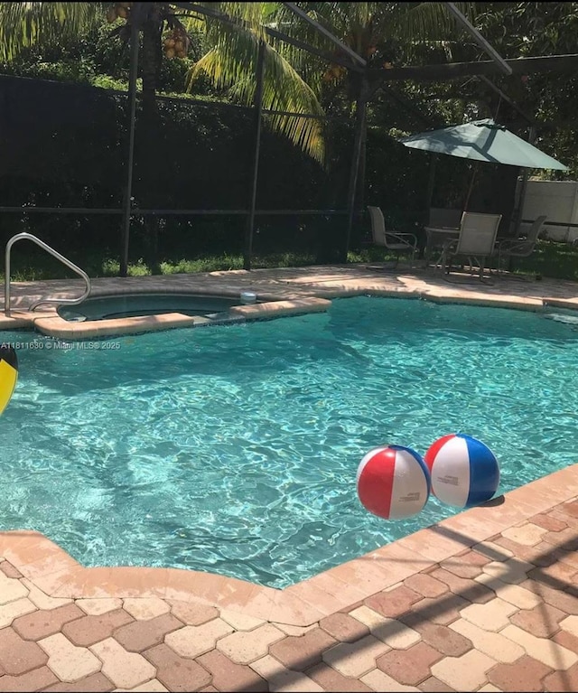 411 Martin Rd, Margate, FL 33068 - swimming pool featuring a lanai and a patio