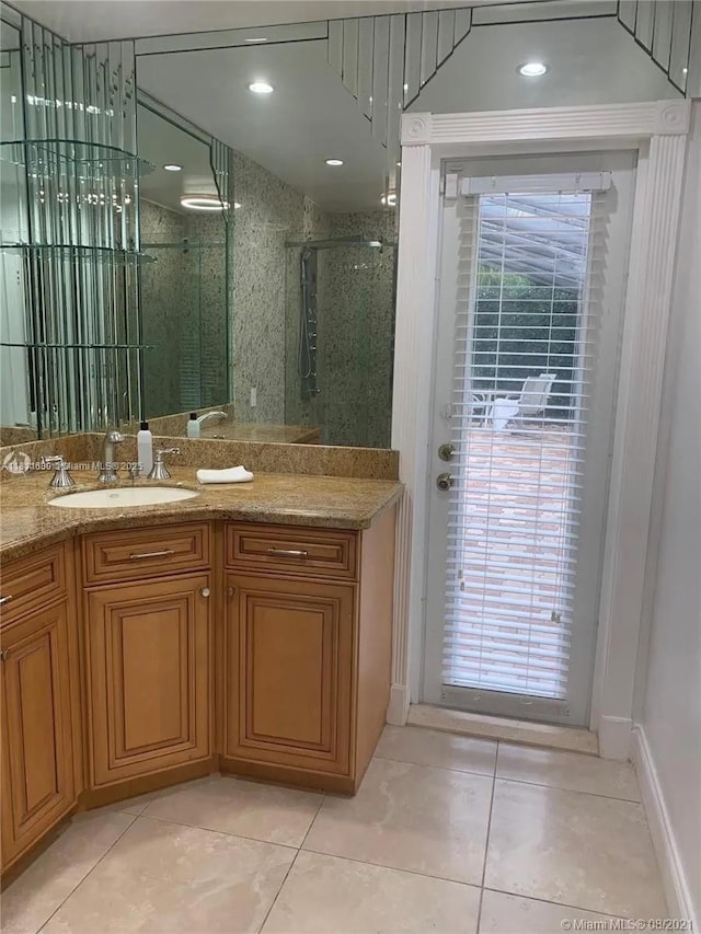411 Martin Rd, Margate, FL 33068 - full bathroom with tile patterned floors, a stall shower, and vanity
