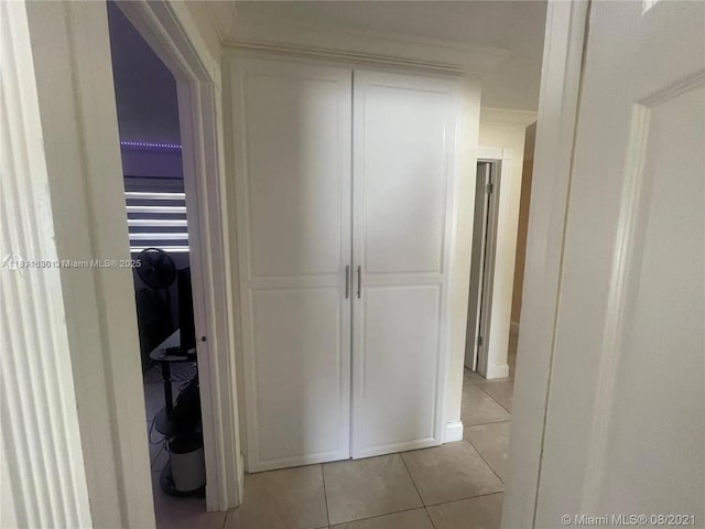 411 Martin Rd, Margate, FL 33068 - hall with light tile patterned flooring and crown molding