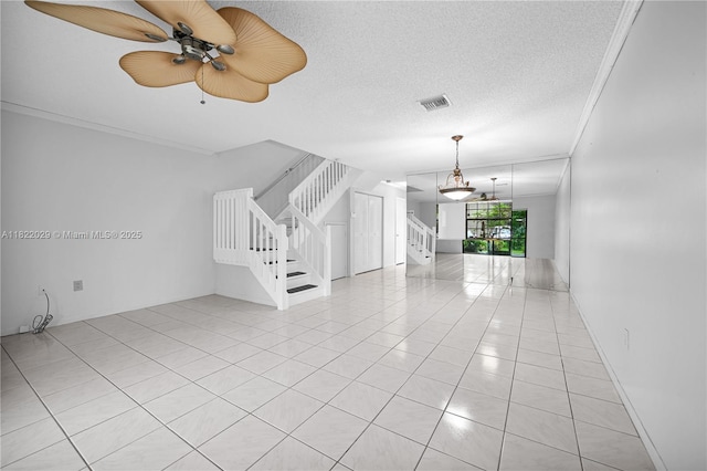 502 Westree Ln, Plantation, FL 33324 - unfurnished living room featuring light tile patterned floors, stairs, a ceiling fan, ornamental molding, and a textured ceiling