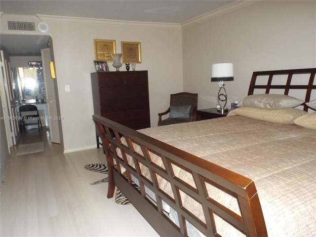 1904 S Ocean Dr Unit 405, Hallandale Beach, FL 33009 - bedroom featuring wood finished floors and crown molding