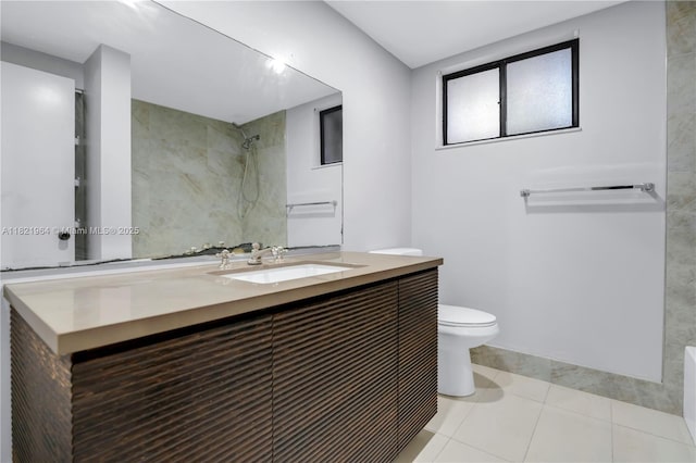 511 Ives Dairy Rd Unit 104-6, Miami, FL 33179 - full bathroom featuring vanity, a shower, tile patterned flooring, and tile walls