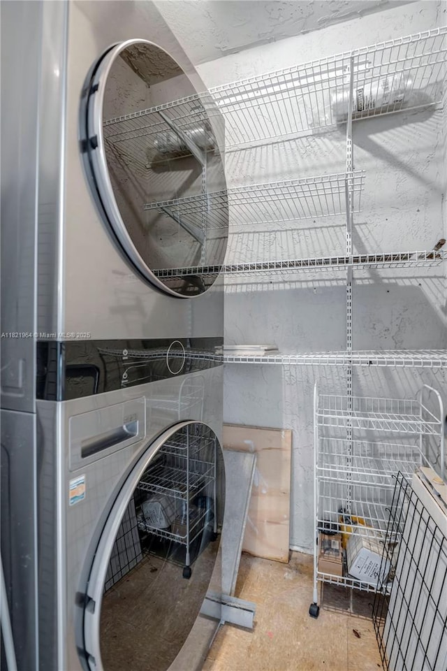 511 Ives Dairy Rd Unit 104-6, Miami, FL 33179 - laundry room featuring estacked washer and dryer