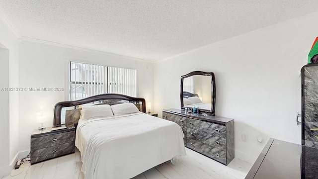 7180 NW 179th St Unit 105, Hialeah, FL 33015 - bedroom with a textured ceiling and crown molding