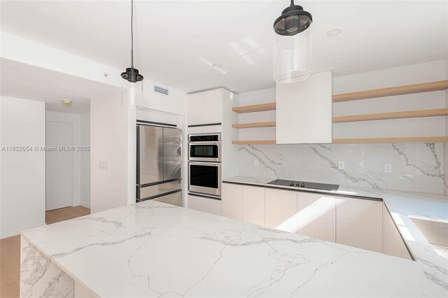 824 SE 12th Ct, Fort Lauderdale, FL 33316 - kitchen featuring open shelves, appliances with stainless steel finishes, modern cabinets, white cabinets, and light stone countertops