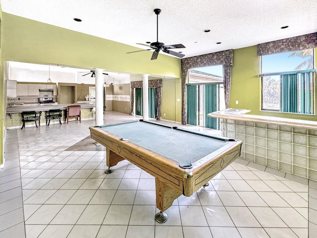 4550 NW 65th Way, Lauderhill, FL 33319 - recreation room with a ceiling fan, a textured ceiling, ornate columns, light tile patterned floors, and billiards