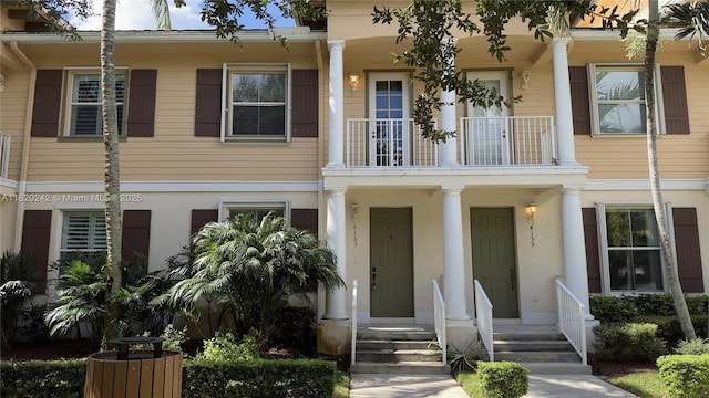 4163 Maya Cay Ln, Jupiter, FL 33458 - multi unit property featuring a balcony and covered porch