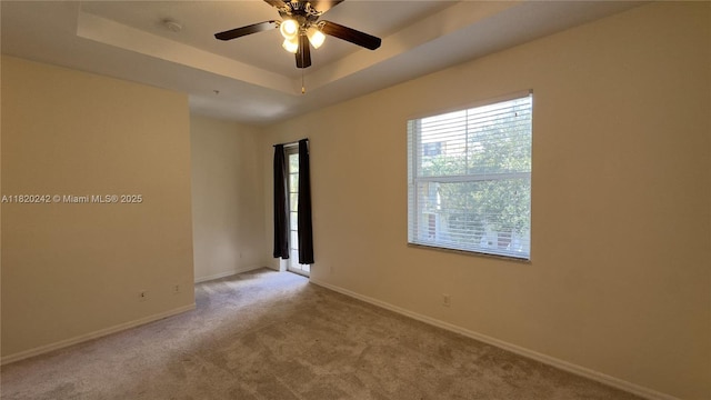 4163 Maya Cay Ln, Jupiter, FL 33458 - carpeted spare room with a smoke detector, a ceiling fan, and a raised ceiling