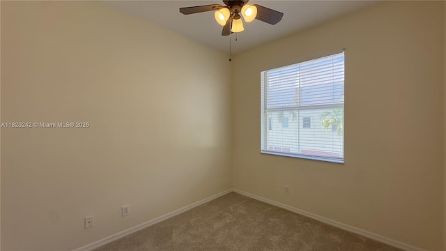 4163 Maya Cay Ln, Jupiter, FL 33458 - carpeted empty room with baseboards and ceiling fan