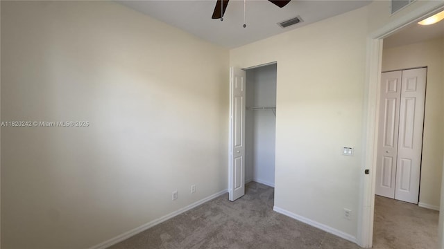 4163 Maya Cay Ln, Jupiter, FL 33458 - unfurnished bedroom with light colored carpet and a ceiling fan