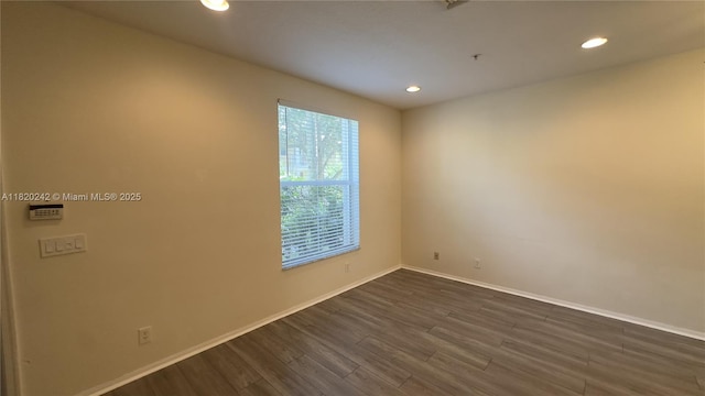 4163 Maya Cay Ln, Jupiter, FL 33458 - unfurnished room with dark wood-type flooring, recessed lighting, and fire sprinkler in ceiling