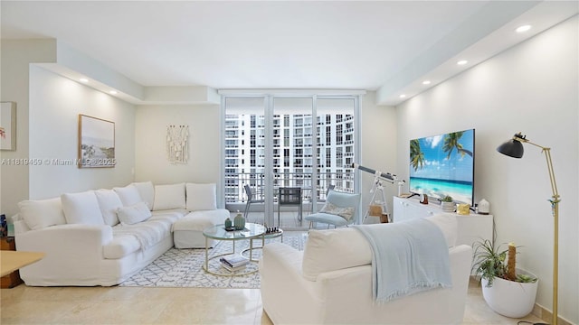 801 Brickell Key Blvd Unit 2210, Miami, FL 33131 - tiled living room with expansive windows and recessed lighting