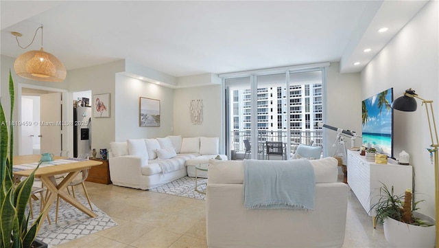 801 Brickell Key Blvd Unit 2210, Miami, FL 33131 - living area featuring light tile patterned flooring, recessed lighting, and expansive windows