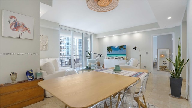 801 Brickell Key Blvd Unit 2210, Miami, FL 33131 - dining space featuring light tile patterned floors, expansive windows, and recessed lighting