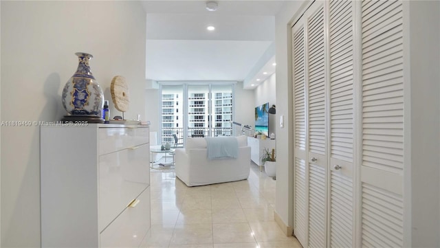801 Brickell Key Blvd Unit 2210, Miami, FL 33131 - corridor with light tile patterned flooring and recessed lighting