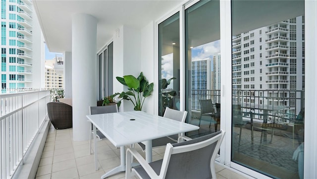 801 Brickell Key Blvd Unit 2210, Miami, FL 33131 - balcony with a city view and outdoor dining space