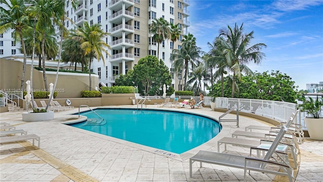 801 Brickell Key Blvd Unit 2210, Miami, FL 33131 - community pool featuring a patio