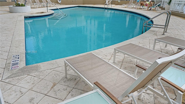 801 Brickell Key Blvd Unit 2210, Miami, FL 33131 - community pool featuring a patio