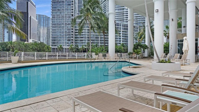 801 Brickell Key Blvd Unit 2210, Miami, FL 33131 - community pool featuring a patio area and a city view
