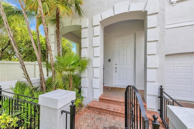 21235 NE 33rd Ave, Aventura, FL 33180 - doorway to property featuring a garage