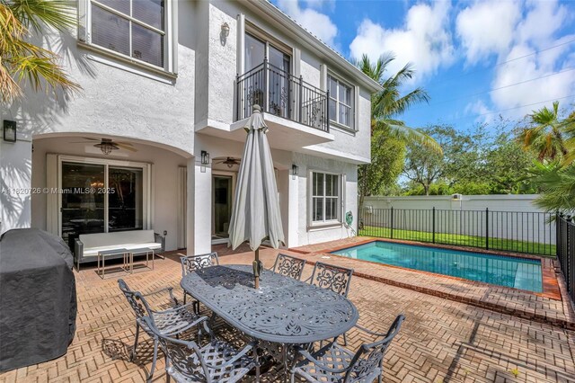 21235 NE 33rd Ave, Aventura, FL 33180 - view of swimming pool featuring a patio area and ceiling fan