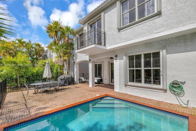 21235 NE 33rd Ave, Aventura, FL 33180 - outdoor pool with a patio, outdoor dining area, and ceiling fan