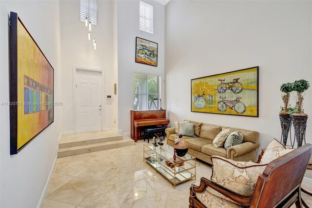 21235 NE 33rd Ave, Aventura, FL 33180 - living area featuring marble tiled floors and a high ceiling