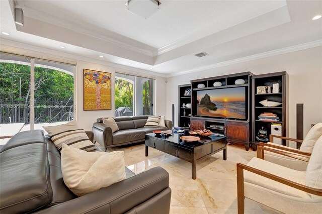 21235 NE 33rd Ave, Aventura, FL 33180 - living room featuring a raised ceiling, crown molding, healthy amount of natural light, and recessed lighting