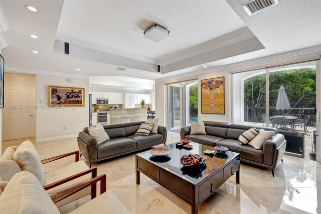 21235 NE 33rd Ave, Aventura, FL 33180 - living room featuring a raised ceiling, ornamental molding, recessed lighting, and light marble finish floors