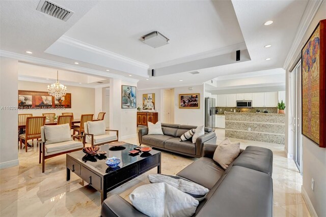 21235 NE 33rd Ave, Aventura, FL 33180 - living area with a tray ceiling, ornamental molding, a chandelier, recessed lighting, and light marble finish floors