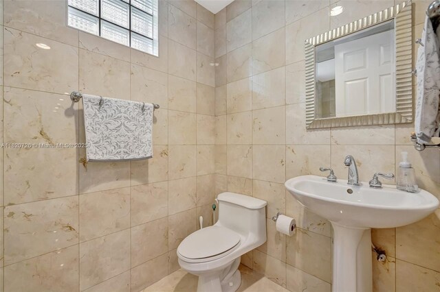 21235 NE 33rd Ave, Aventura, FL 33180 - bathroom with tile walls and toilet